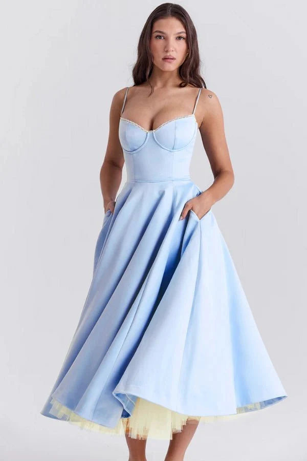 fit-and-flare silhouette', 'cinched waist', '1950s inspired gown', 'structured bodice', and 'sweetheart neckline