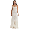 Woman wearing a white Kouvr strapless dress on a white background